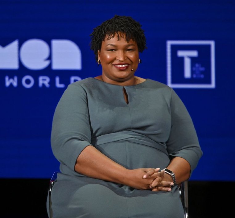 Stacey Abrams looking happy in short hair